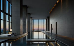 A beautiful view of the Tokyo skyline from a high-end luxury hotel, showing skyscrapers and the cityscape.